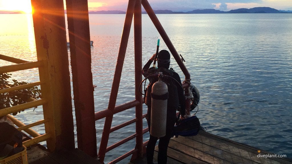 Diver on the lift going for a night dive at the rig diving seaventures rig sabah