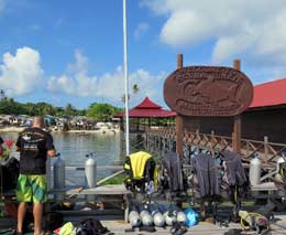 Logoshot at their jetty diving with scuba junkies mabul feature