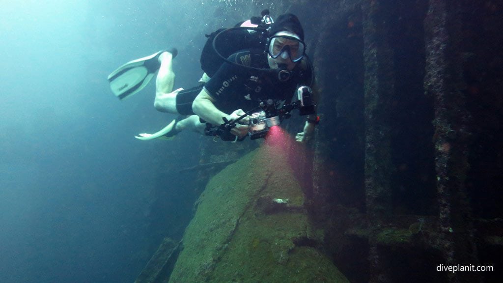 Scale of the wreck dwarfs divers at toa maru gizo diving solomon islands