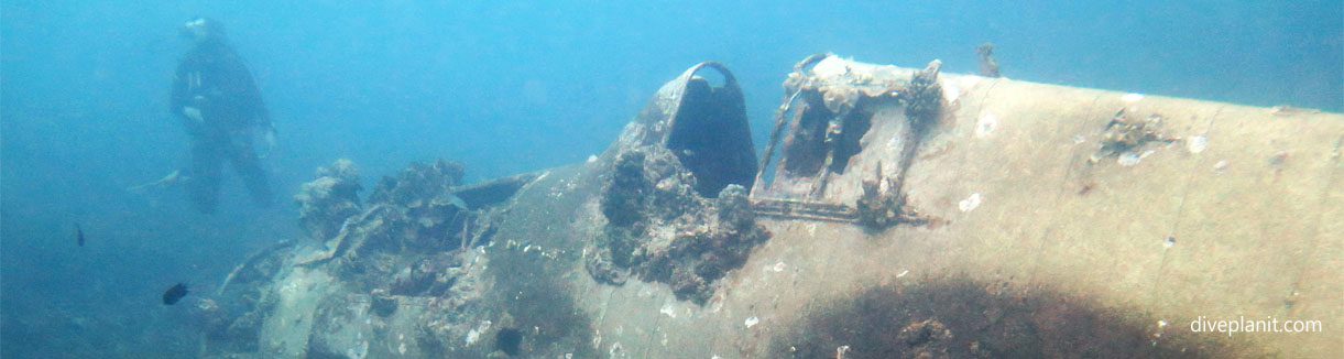 Wreck with diver for scale at hellcat wreck gizo diving solomon islands blog banner