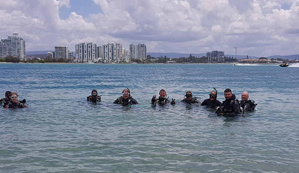 365 Dive for Debris Cleanup Crew in water