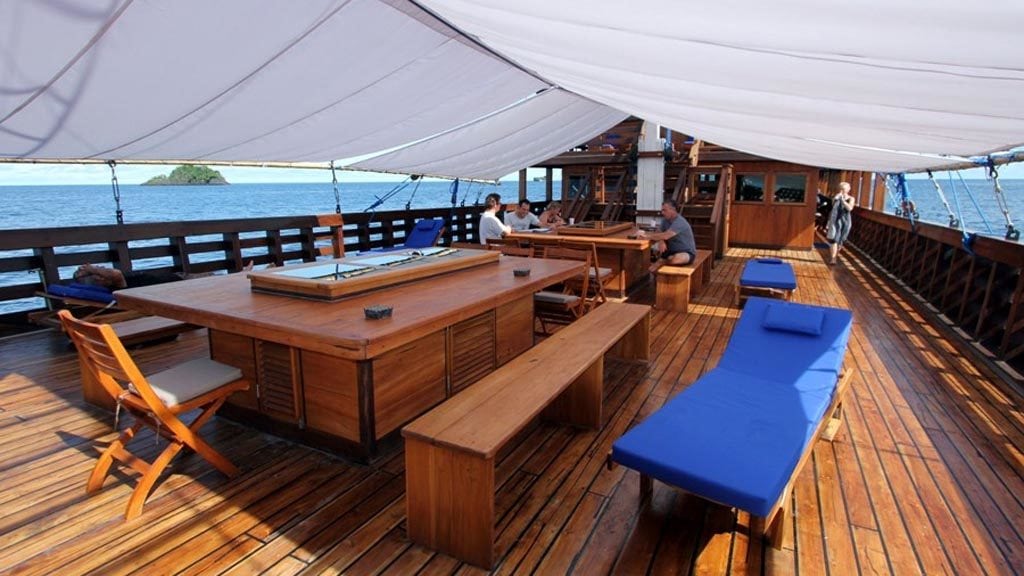 Amira liveaboard komodo raja ampat indonesia covered deck