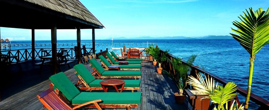 Borneo divers mabul sabah borneo malaysia sunbathing on the jetty