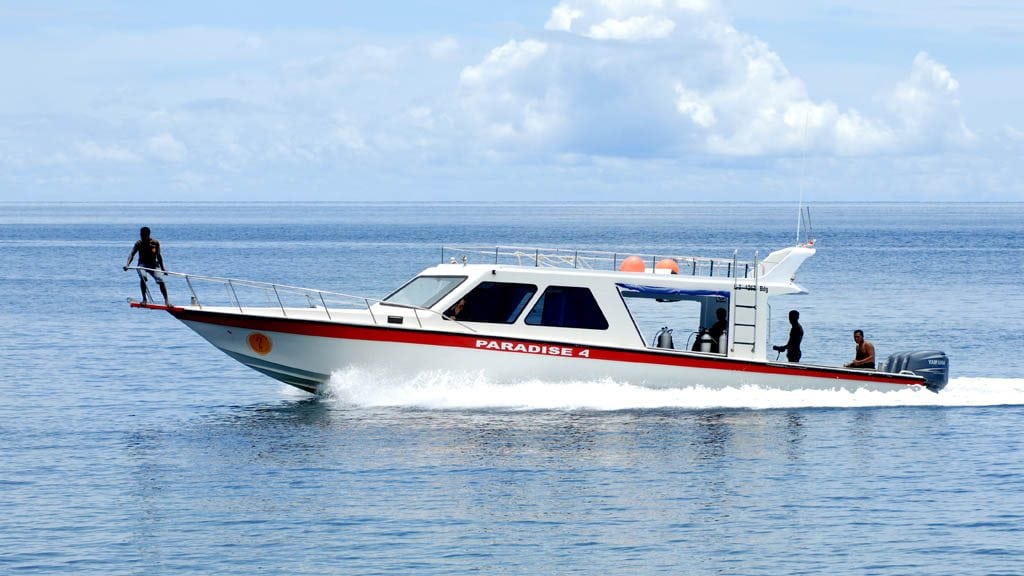 Papua paradise eco resort raja ampat indonesia dive boat underway