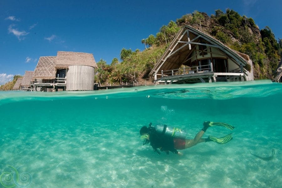 Misool eco resort batbitim island raja ampat indonesia water cottages diver