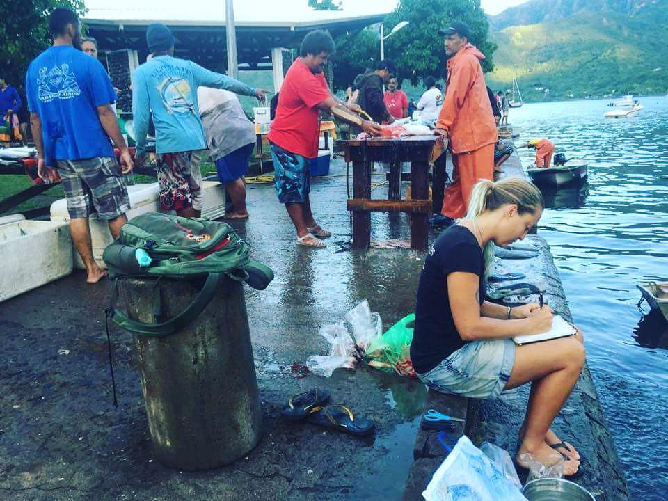 Alice at the fish market in Moorea