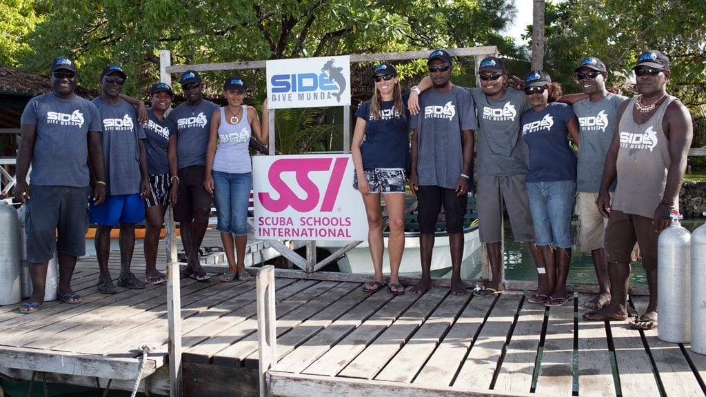 Dive munda solomon islands staff on the jetty credit klaus obermeyer