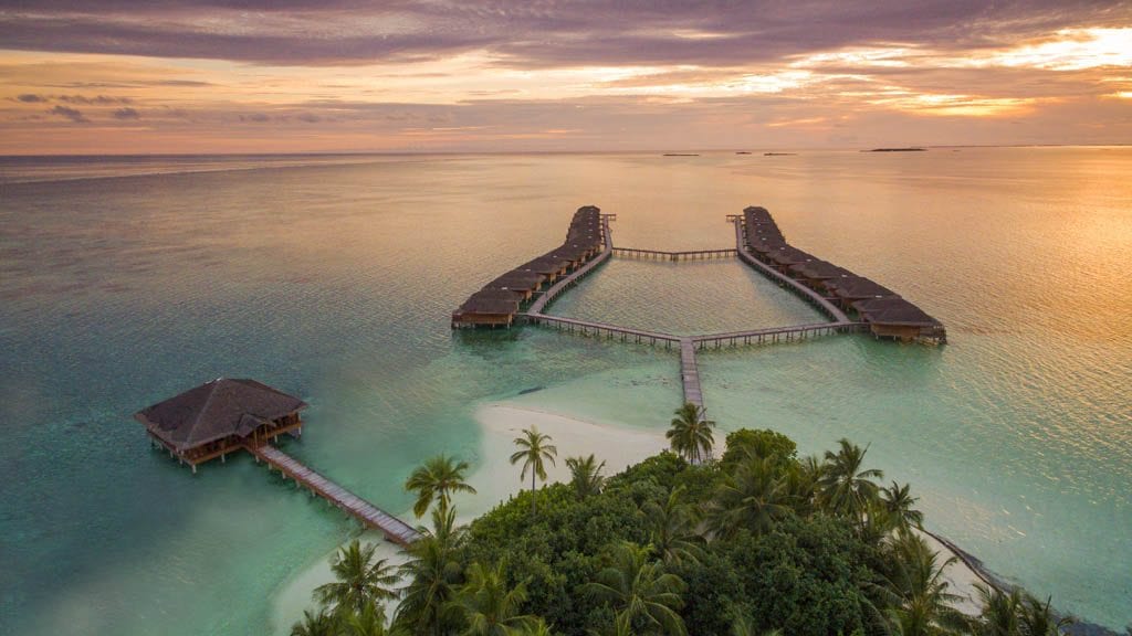 14 Medhufushi Island Resort & Werner Lau Dive Centre, Maldives - sunset over resort