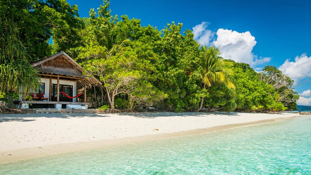Papua Diving Resorts, Sorido Bay Resort, Kri Island, Raja Ampat, Indonesia - Beachfront Cottage