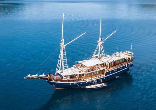 The Aurora Liveaboard, a spacious yacht, designed for a discerning clientele in the traditional Phinisi style cruises Bali, Komodo, Raja Ampat, Banda Sea