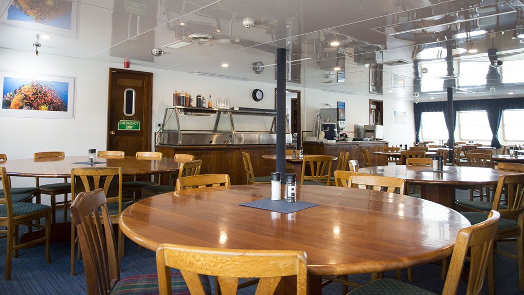 3 divers den oceanquest liveaboard great barrier reef australia dining room