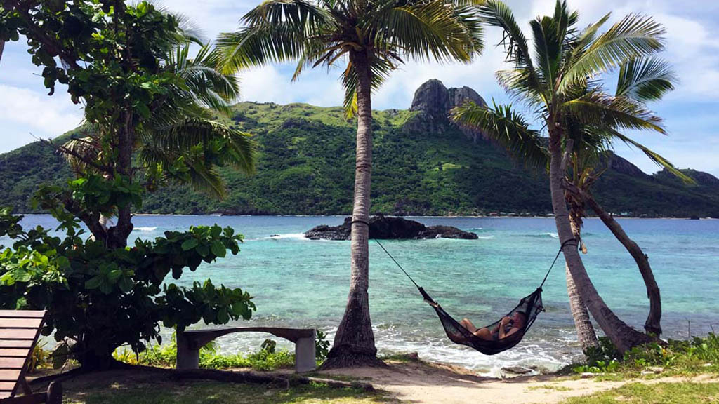 8 barefoot kuata resort yasawa islands fiji lazing in the hammock