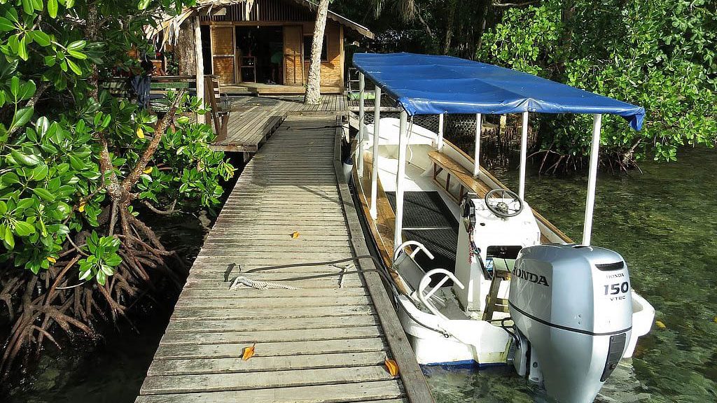 Uepi Dive Resort, Uepi Island, Solomon Islands / Solomons dive boat jetty dive shop diveplanit 0025