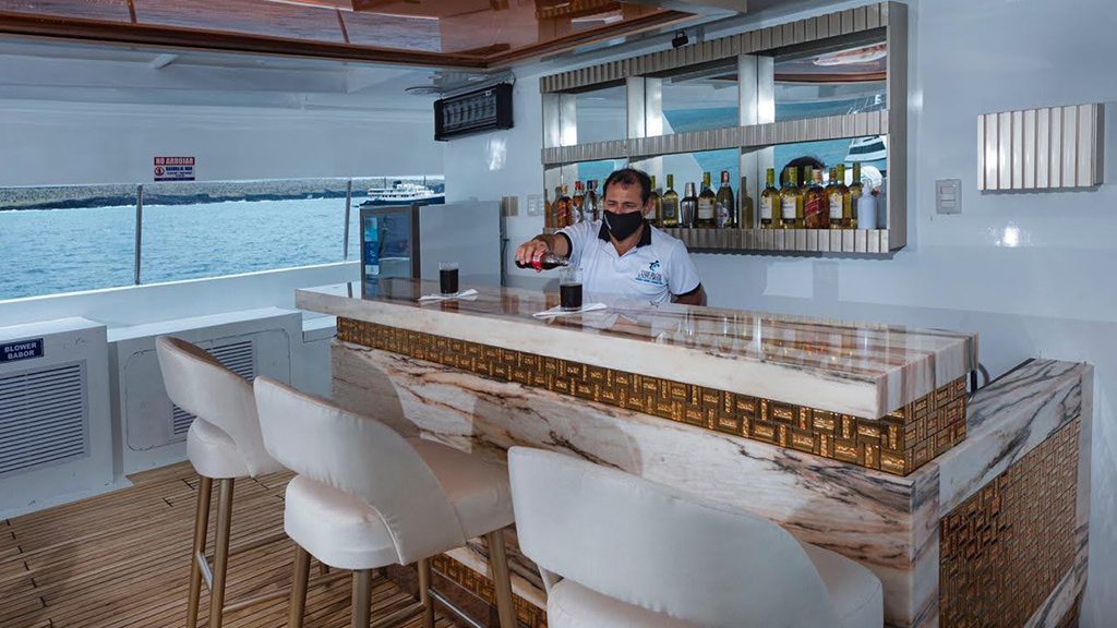 17 tiburon explorer liveaboard galapagos islands upper deck bar