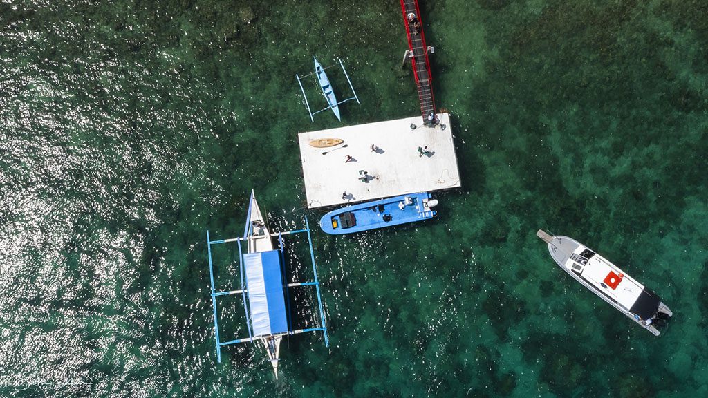 5 asia divers el galleon puerta galera philippines dive jetty arial