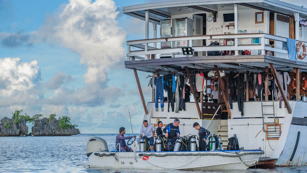 8 ambai liveaboard indonesia divers on dive deck