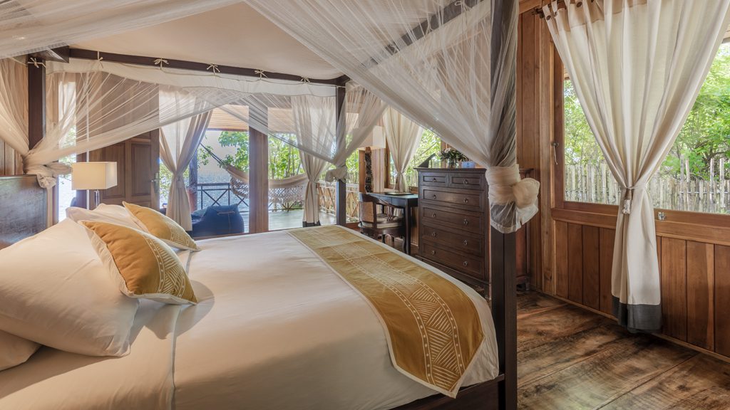 37 siladen resort and spa north sulawesi indonesia double bedroom beach villa room1