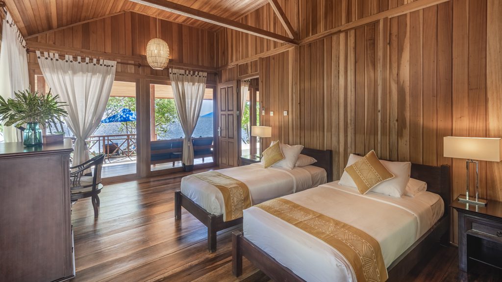 38 siladen resort and spa north sulawesi indonesia double bedroom beach villa room2