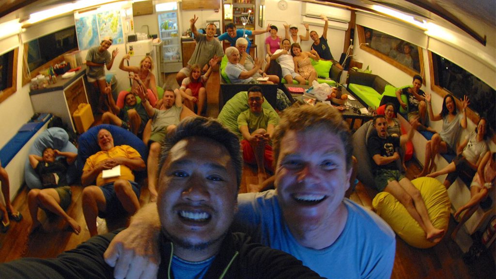 18 solitude one liveaboard philippines lounge with guests
