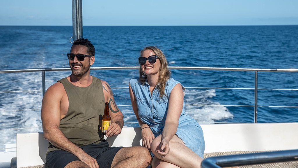 Passions of paradise cairns great barrier reef couple on deck