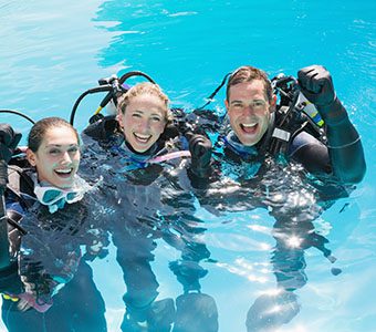 Blue friday 3 divers shutterstock 199723532 feature