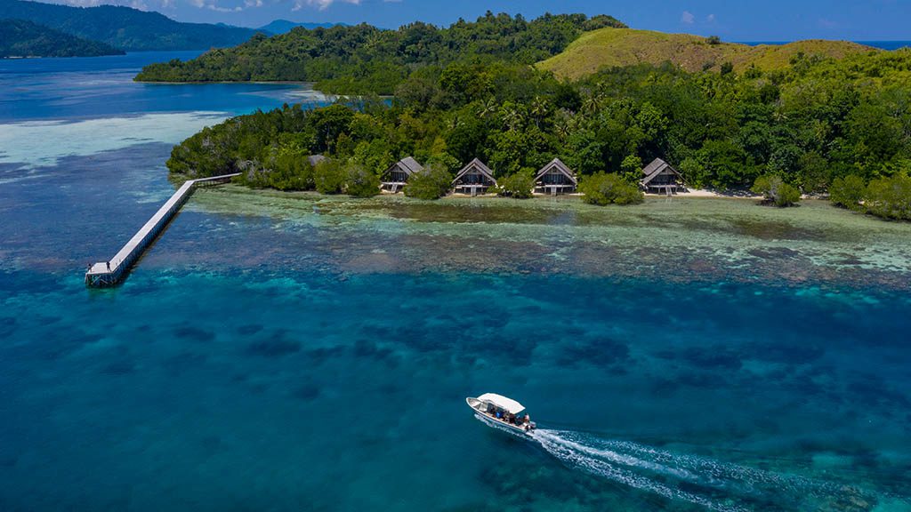 2 kusu island resort halmera indonesia aerial view with jetty hero